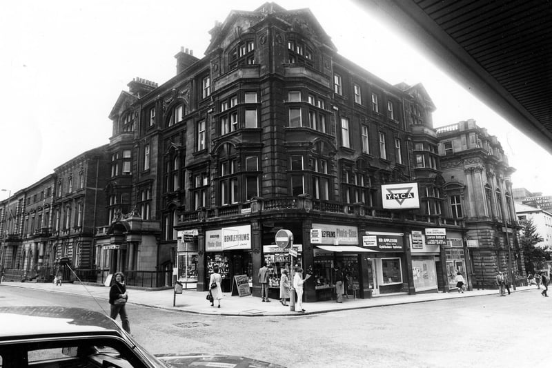 The junction of Albion Street and Albion Place in June 1984, showing the YMCA building in the centre. Shops on the ground floor of the building are Eastwood tobacconists, Bentley films photographic equipment, Raymond Appleson opticians, a vacant shop and Hunting Lambert travel agents.