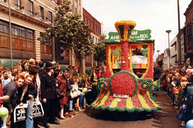 Lewis's decorated float 'steams' up The Headrow during the 7th Lord Mayor's Parade in June 1984.