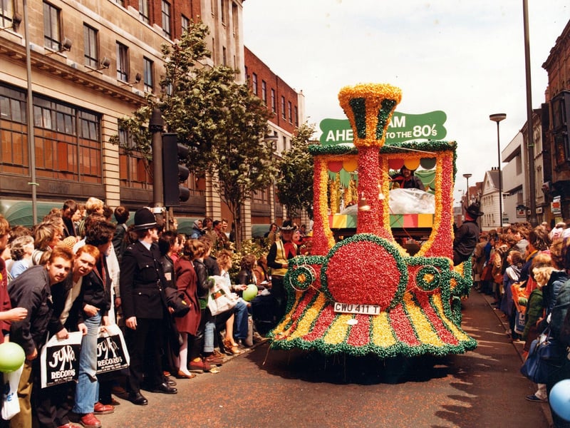 Lewis's decorated float 'steams' up The Headrow during the 7th Lord Mayor's Parade in June 1984.