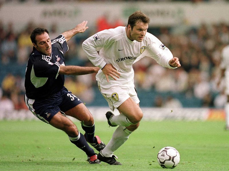 Mark Viduka gets past Tottenham Hotspur's Ramon Vega.