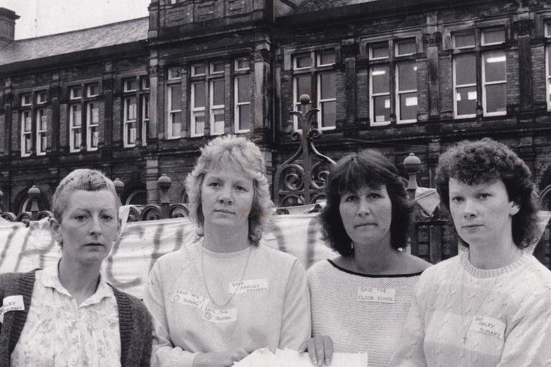 'Save Armley Primary' was the no-nonsense message from these parents' action group members in JUly 1986. Pictured, from left, are Irene Merrill, Lynn Edwards, Wendy Haigh and Ellen Trueman with their petition outside the school.