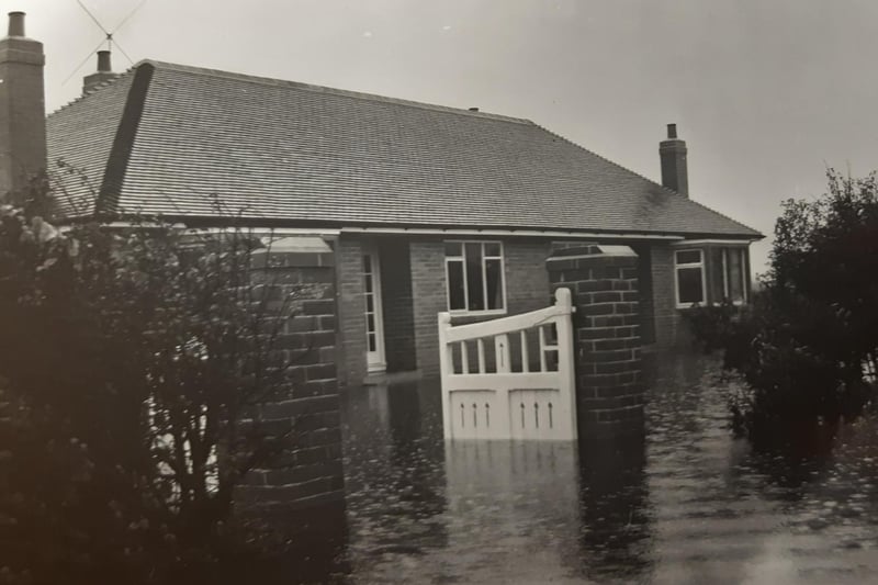 Another flooded scene of a bungalow in New Road, Thornton