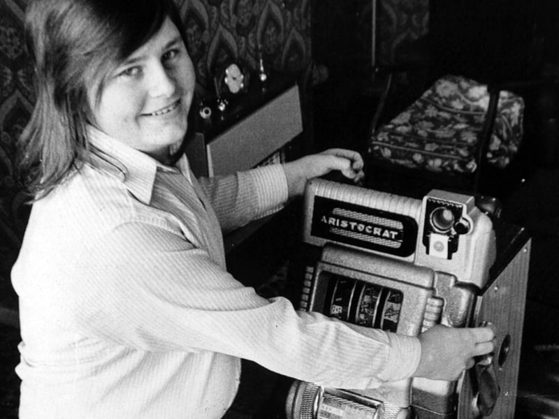 This Ken Midgley who kept a one-armed bandit in the living room of his home on Ironwood Approach in Seacroft. He is pictured in February 1975.