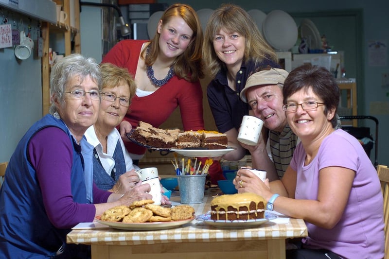 Staff from Doodlepots in Whitby host a Macmillan coffee morning.