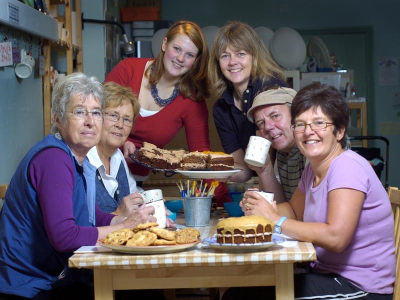 Staff from Doodlepots in Whitby host a Macmillan coffee morning.