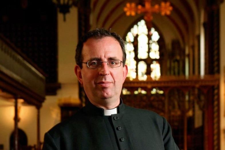 Reverend Richard Coles first became known as part of the 80s band The Communards, in particular, for their smash hit cover of "Don't Leave Me This Way". He received his MA in Theology and Religious Studies from the University of Leeds in 2005. He is now vicar of Finedon in Northamptonshire and regularly appears on radio and television shows such as QI and "Would I Lie to You? He recently published his book "The Madness of Grief: A Memoir of Love and Loss" following the death of his husband David.