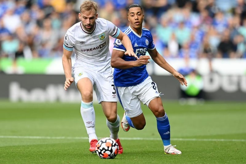 Charlie Taylor gets the run on Youri Tielemans.