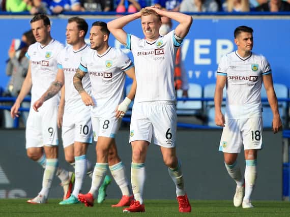 Burnley's English defender Ben Mee reacts after his team's third goal was ruled out following a VAR decision during the English Premier League football match between Leicester City and Burnley at King Power Stadium in Leicester, central England on September 25, 2021. - The match ended 2-2.
