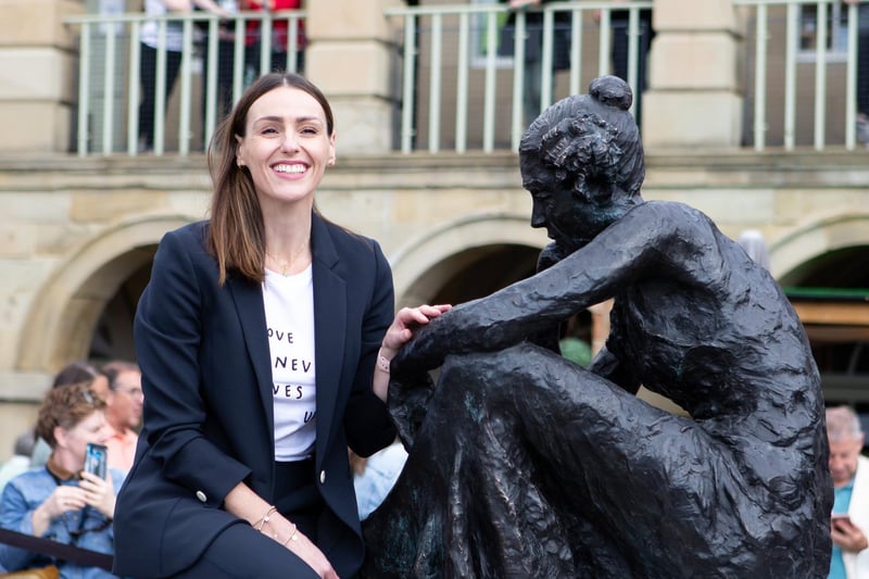 Suranne Jones with the Anne Lister statue at The Piece Hall