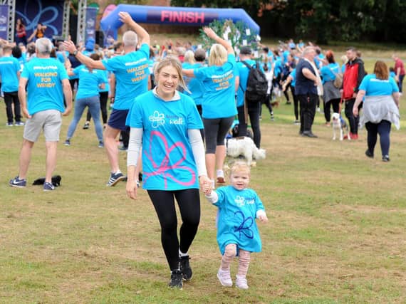 Amy Allan and daughter Arabella, 20 months who were walking for grandmother and great grand mother Christine Bottom