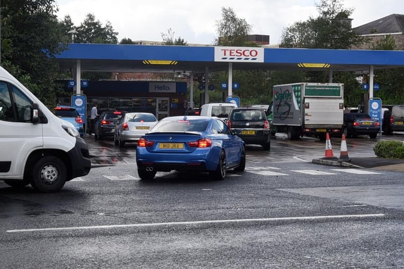 Queues this afternoon at Tesco petrol station, Tesco Extra, Central Park Way, Wigan