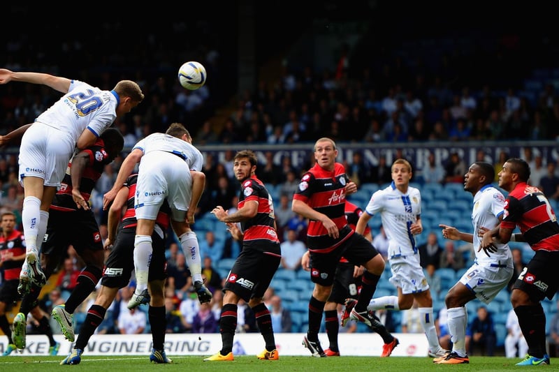 Matt Smith rises to head the ball goalward during Championship clash against Queens Park Rangers at Elland Road in August 2013.