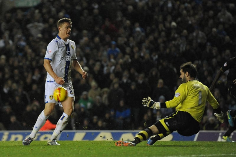 Matt Smith is thwarted by Wigan Athletic goalkeeper Scott Carson during the Championship clash at Elland Road in December 2013. Leeds won 2-0 thanks to two goals from Ross McCormack.