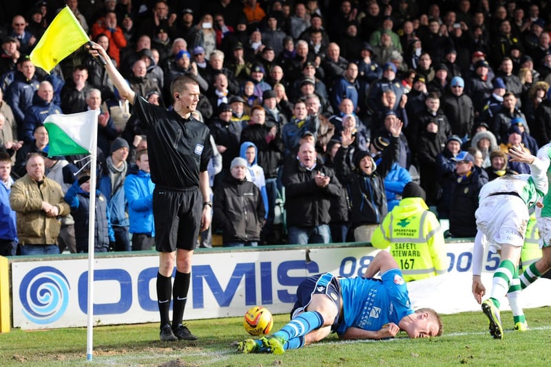 Matt Smith goes down injured during the Championship clash against Yeovil Town at Huish Park in February 2014.