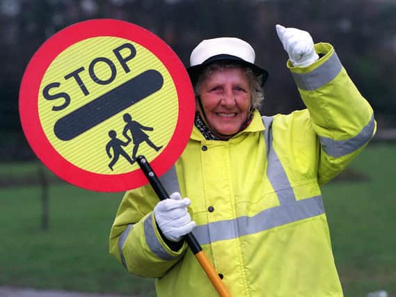 Enjoy these lollipop lady memories from Leeds schools in the 1990s. PIC: James Hardisty