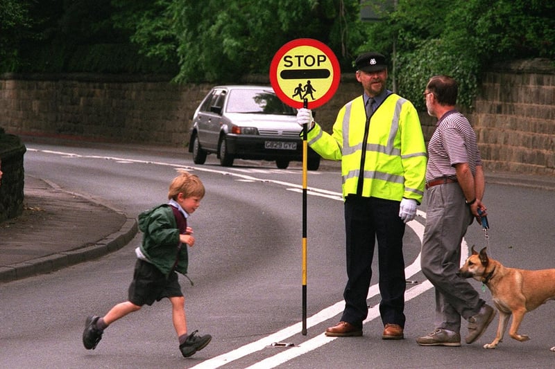 Lollipop man, David Bollon, on patrol outside Horsforth's West Brook Lane Primary in June 1997.