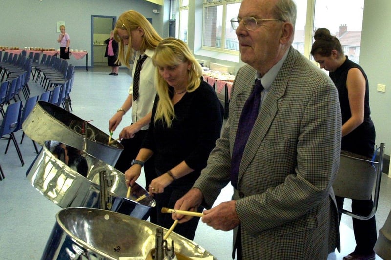 Lord Merlyn-Rees joined members of Merlyn Rees Community High's steel band 'Pantazia' at the opening of the new school hall.