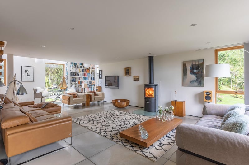 Open plan but still cosy with the warming central feature in this room.