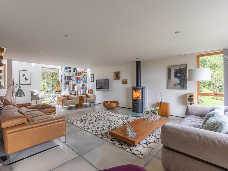 Open plan but still cosy with the warming central feature in this room.