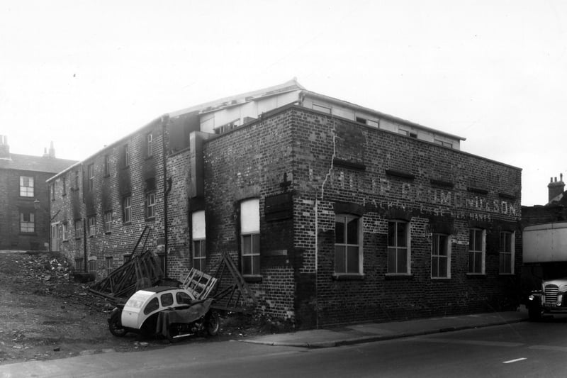 The premises of Philip Redmond and Sons Ltd on Elland Road pictured in September 1960. They made packing cases. The factory was referred to as a sawmill. Leman Terrace is on the left, looking up to Little Town Lane.