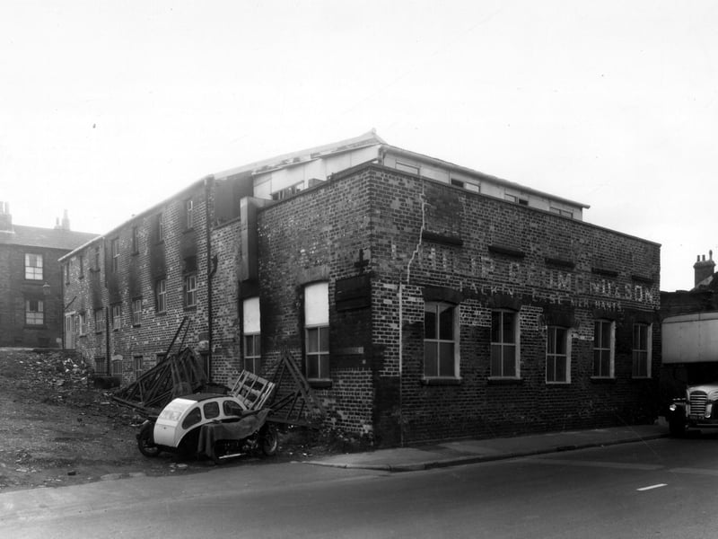 The premises of Philip Redmond and Sons Ltd on Elland Road pictured in September 1960. They made packing cases. The factory was referred to as a sawmill. Leman Terrace is on the left, looking up to Little Town Lane.