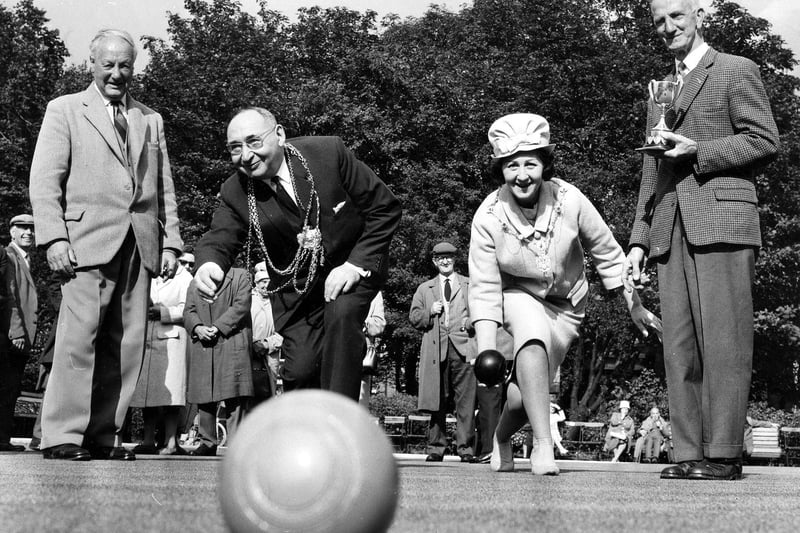 Lord Mayor of Leeds, Alderman Joshua S. Walsh and his wife, the Lady Mayoress, have a turn at bowling during the Veteran's Cup Final at Cross Flatts Park in August 1966.