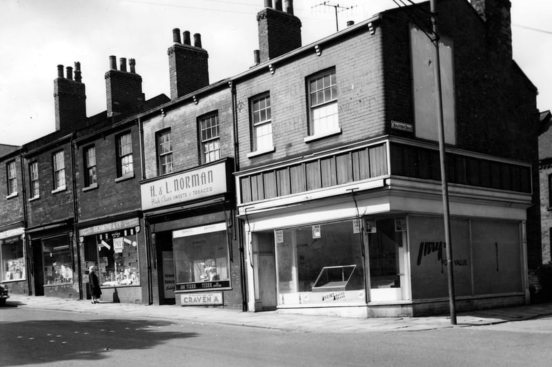 A parade of shops on Beeston Road in July 1964 taken opposite the junction with Malvern Road.