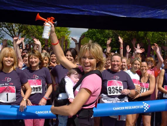 Leeds model Nell McAndrew starts Race for Life at Temple Newsam Park in May 2005. She is pictured with her niece Abi.