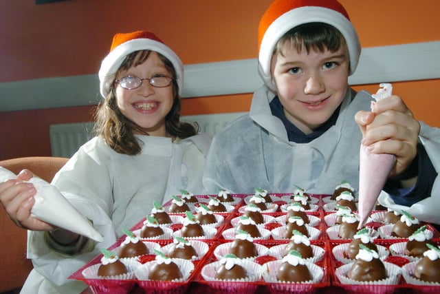 Children enjoyed a Christmas visit to Greggs Bakery in Bramley. Pictured is Hannah Portland and Liam Brown.