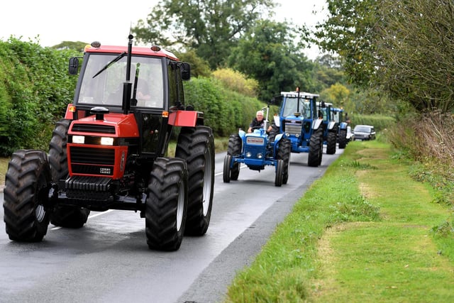 Tractors in convoy arriving