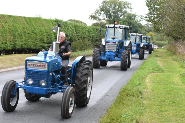 Tractors in convoy arriving