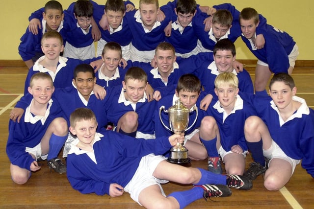Morley High School were celebrating being crowned Yorkshire Cup winners. Pictured is captain Ryan Sales with the trophy.