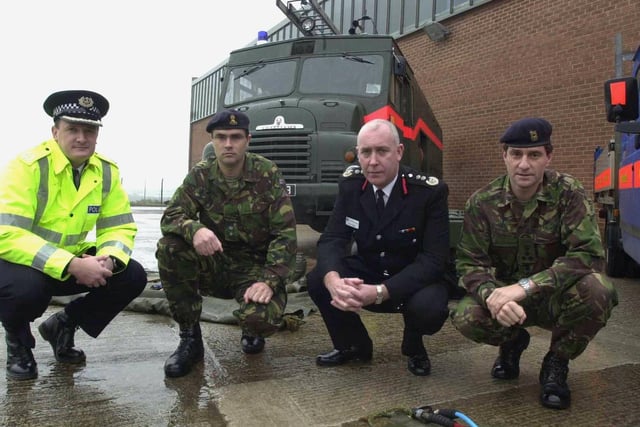 A Green Goddess was at the temporary fire station at Morley. Pictured, from left, is Grahame Maxwell, West Yorkshire Police assistant chief constable, Lt.Col. Dickie Davis, commanding officer of 22 Engineer Reg, Phil Toase, chief fire officer and Brigadier David Shaw, commander 15 (NE) Brigade.