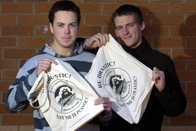 Students Tom Howell and Matt Rodgers with a certified Fairtrade bag.