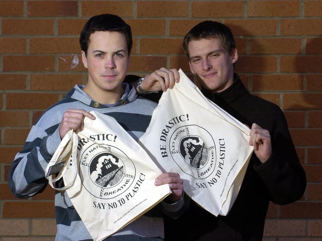 Students Tom Howell and Matt Rodgers with a certified Fairtrade bag.