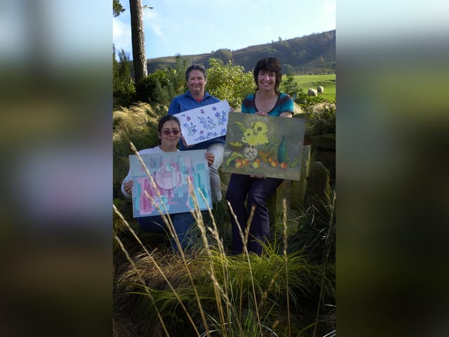 Sisters Elaine Welford, Irene Jackson and Linda Raw organise an exhibition.