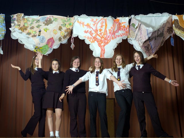 Caedmon School students make huge pairs of pants to be displayed on the school stage.