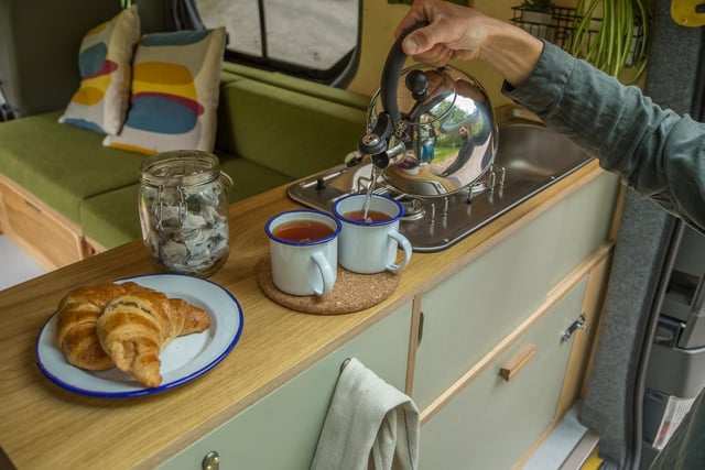 This smaller campervan fitted out by Tom and Caitlin features ply furniture but there is an oak veneer on the worktops,which have to be more hardwearing.