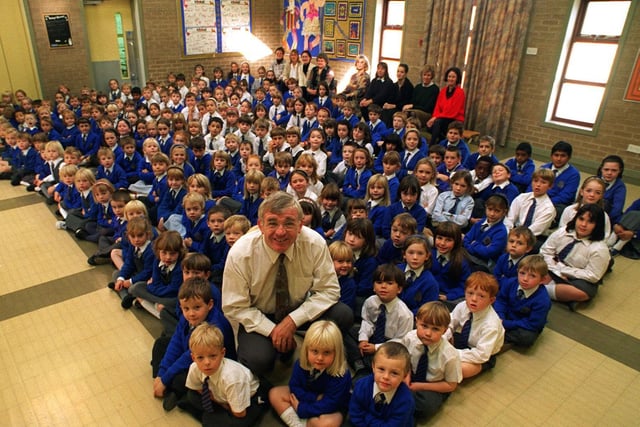 Full house. Headteacher Alan Padden pictured with pupils in the assembly hall at Adel Primary School,