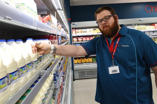 Staff member Tom Quinn in the chilled food section