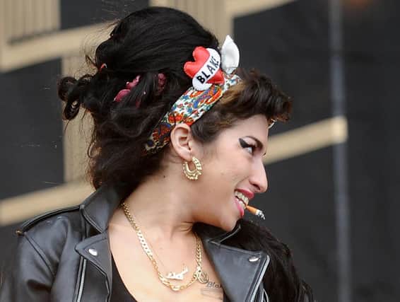 This iconic photo of Amy Winehouse was used in publications all over the world. Dave  took it at T in the Park in Scotland in 2008