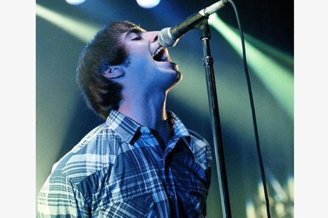 Oasis at a sold-out Empress Ballroom, Blackpool, on October 2 1995. One of the band's seminal gigs which helped propel them into superstars and a photo which captured Liam Gallagher's unique way with a mic.