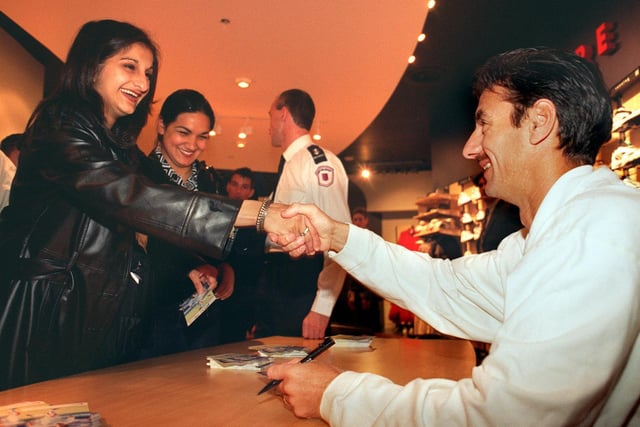 Leeds United striker Ian Rush visited the store in October 1996. He is pictured shaing hands wirh Kully Kaur from Beeston.