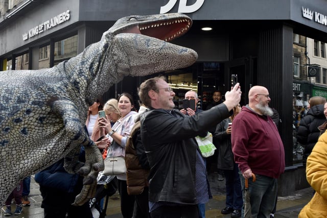 A selfie with Richie Raptor during the Dino Day in Lancaster City Centre. Photo: David Hurst