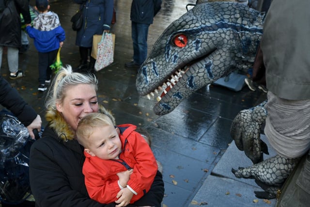 One youngster isn't keen to meet the baby dinsoaurs during the Dino Day in Lancaster City Centre. Photo: David Hurst