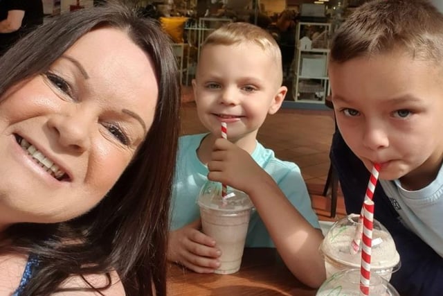 "Me and my beautiful grandsons enjoying a milkshake. Precious memories."