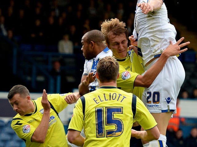 Matt Smith heads towards goal.