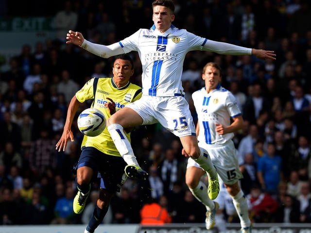 Sam Byram holds off Birmingham City's Jesse Lingard.