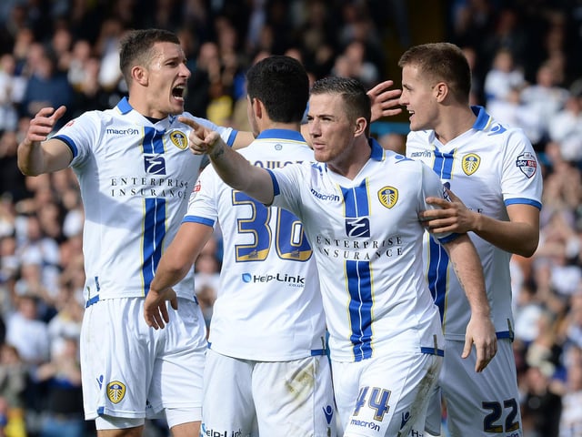 Ross McCormack celebrates scoring Leeds United's opening goal. He guided a shot into an empty net after a poor clearance from a long ball by Birmingham City goalkeeper Darren Randolph.