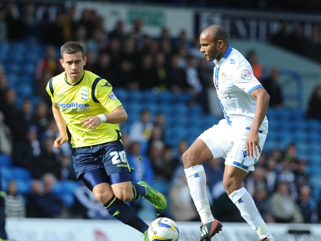 Rodolph Austin takes on Birmingham City's Oliver Lee.